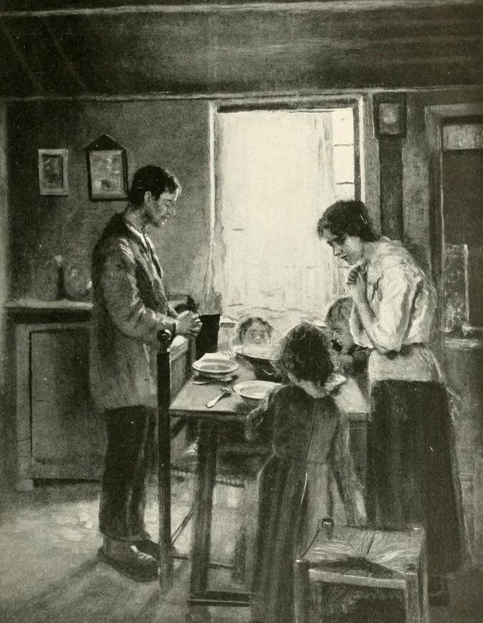 Una famiglia ringrazia Dio prima del pasto